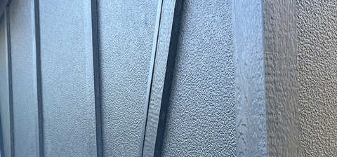LP SmartSide Pebbled Stucco Panel Siding (Photo: Business Wire)