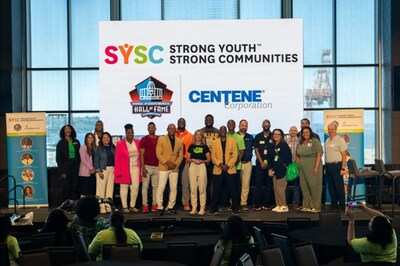 Photo includes: Beth Johnson, President & CEO, Coordinated Care, Pro Football Hall of Famers Darrell Green, Walter Jones and Aeneas Williams, and UNC Alumni Basketball Player Iman McFarland addressing local youth.